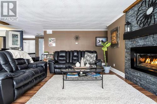 8 Tiny Beaches Road S, Tiny, ON - Indoor Photo Showing Living Room With Fireplace
