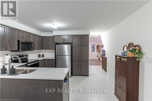 20B - 85 Mullin Drive, Guelph, ON - Indoor Photo Showing Kitchen With Double Sink