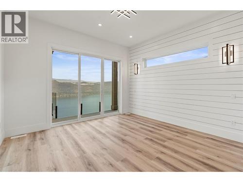 8948 Tavistock Road, Vernon, BC - Indoor Photo Showing Other Room With Body Of Water