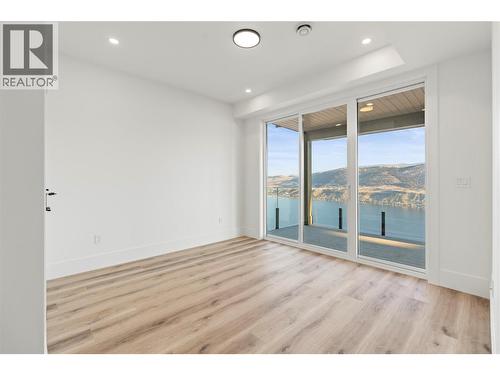 8948 Tavistock Road, Vernon, BC - Indoor Photo Showing Other Room With Body Of Water
