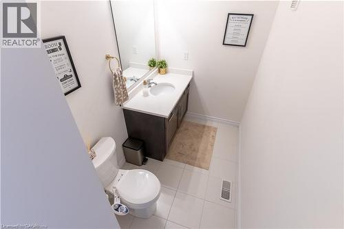 Bathroom featuring vanity and light tile patterned floors - 85 Mullin Drive Unit# 20B, Guelph, ON - Indoor Photo Showing Bathroom