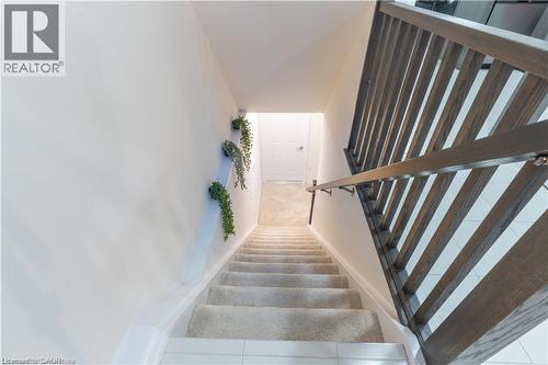 Stairway with baseboards - 85 Mullin Drive Unit# 20B, Guelph, ON - Indoor Photo Showing Other Room