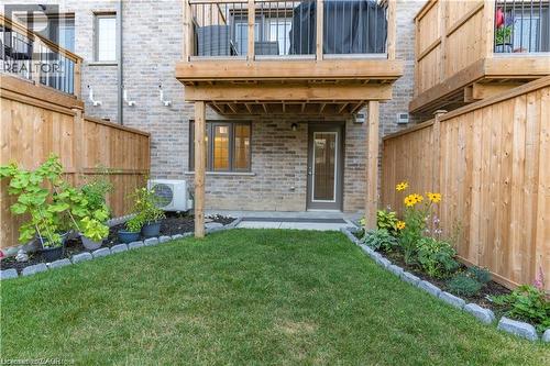 Doorway to property with a patio and brick siding - 85 Mullin Drive Unit# 20B, Guelph, ON - Outdoor With Exterior