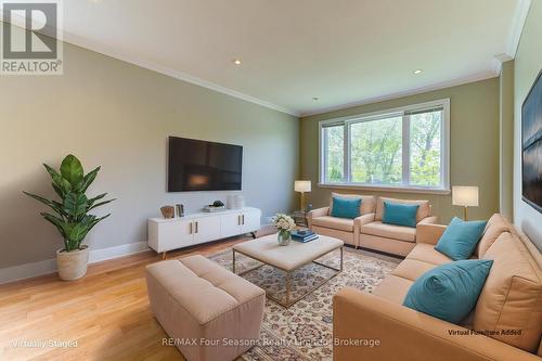 Virtually Staged - 243 River Road E, Wasaga Beach, ON - Indoor Photo Showing Living Room
