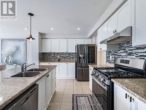 8 Locomotive Crescent, Brampton, ON - Indoor Photo Showing Kitchen With Stainless Steel Kitchen With Double Sink With Upgraded Kitchen