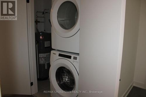 408 - 6 Spice Way, Barrie, ON - Indoor Photo Showing Laundry Room