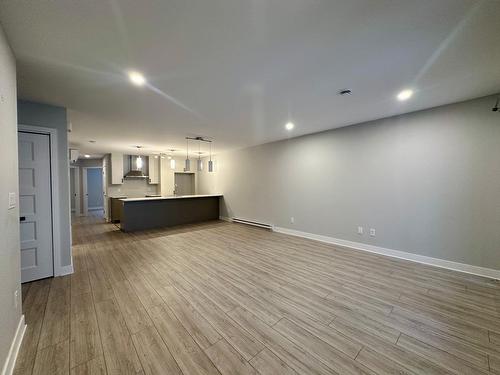 Living room - 103-70 Rue Natura, Bromont, QC - Indoor Photo Showing Other Room