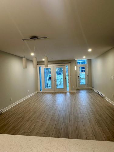 Living room - 103-70 Rue Natura, Bromont, QC - Indoor Photo Showing Other Room