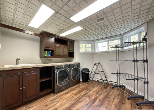 Salle de lavage - 10 Rue De L'Aqueduc, Saint-Alphonse-Rodriguez, QC - Indoor Photo Showing Laundry Room