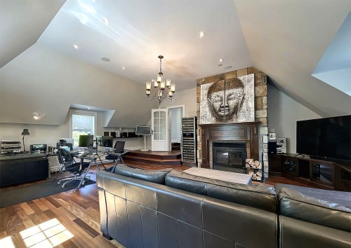 Salle familiale - 10 Rue De L'Aqueduc, Saint-Alphonse-Rodriguez, QC - Indoor Photo Showing Living Room With Fireplace