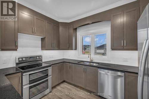 1077 Shearer Drive, Brockville, ON - Indoor Photo Showing Kitchen With Double Sink