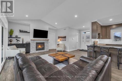 1077 Shearer Drive, Brockville, ON - Indoor Photo Showing Living Room With Fireplace