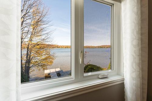 Vue sur l'eau - 242 Rue Larose, Dunham, QC - Indoor Photo Showing Other Room With Body Of Water