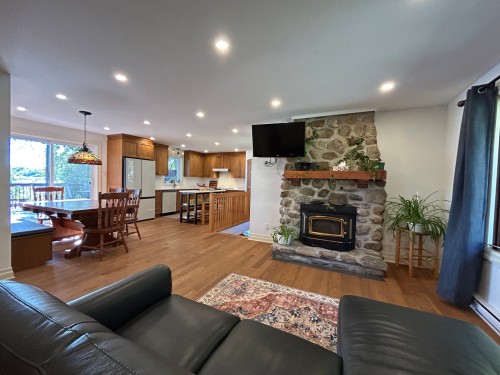 Vue d'ensemble - 474 Route Du Long-Sault, Saint-André-D'Argenteuil, QC - Indoor Photo Showing Living Room With Fireplace