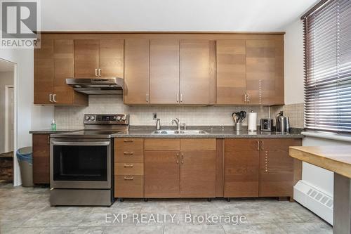 # 519 - 451 The West Mall, Toronto, ON - Indoor Photo Showing Kitchen With Double Sink