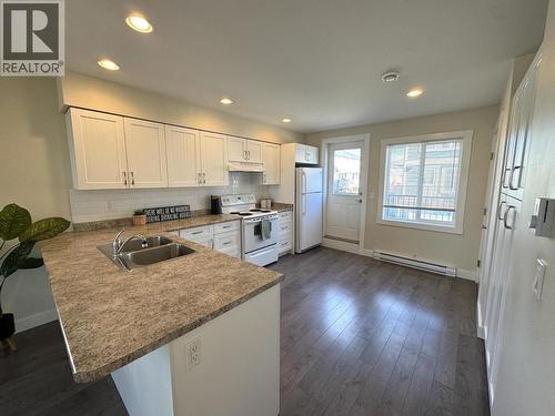 123 10303 112 Street, Fort St. John, BC - Indoor Photo Showing Kitchen With Double Sink
