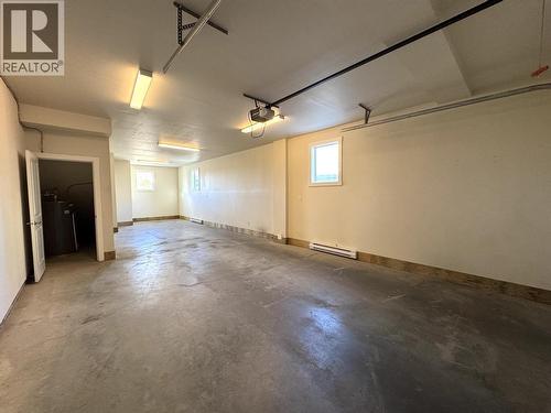 123 10303 112 Street, Fort St. John, BC - Indoor Photo Showing Garage