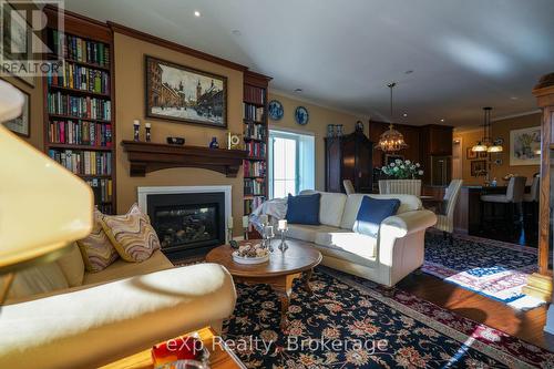 203 - 80 9Th Street E, Owen Sound, ON - Indoor Photo Showing Living Room With Fireplace
