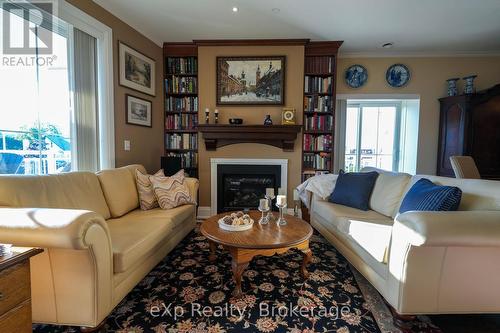 203 - 80 9Th Street E, Owen Sound, ON - Indoor Photo Showing Living Room With Fireplace