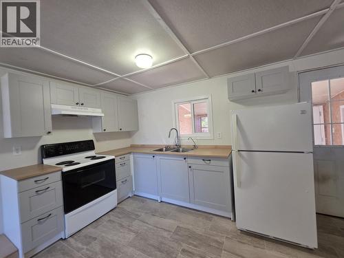 356 Connaught Street, Vanderhoof, BC - Indoor Photo Showing Kitchen With Double Sink