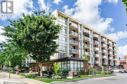 405 - 70 Port Street E, Mississauga, ON - Outdoor With Balcony With Facade