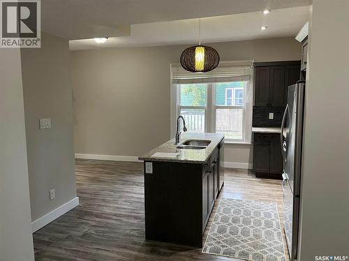 2059 Elphinstone Street, Regina, SK - Indoor Photo Showing Kitchen With Double Sink