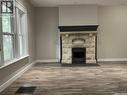 2059 Elphinstone Street, Regina, SK  - Indoor Photo Showing Other Room With Fireplace 