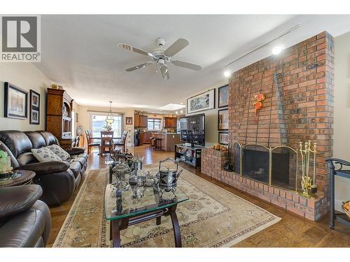 343 Stellar Drive, Kelowna, BC - Indoor Photo Showing Living Room With Fireplace