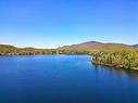 Aerial photo - 104 Ch. Brunette, Lac-Supérieur, QC  - Outdoor With Body Of Water With View 