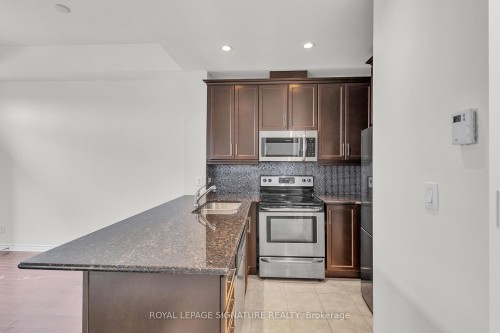 504-5327 Upper Middle Road W, Burlington, ON - Indoor Photo Showing Kitchen With Stainless Steel Kitchen