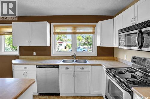 110 3Rd Avenue W, Gravelbourg, SK - Indoor Photo Showing Kitchen With Double Sink