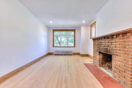 Salon - 5872 Av. Somerled, Montréal (Côte-Des-Neiges/Notre-Dame-De-Grâce), QC - Indoor Photo Showing Other Room With Fireplace
