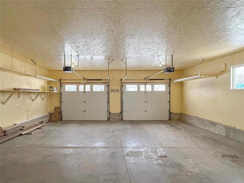 81 Mockingbird Drive, Brandon, MB - Indoor Photo Showing Garage