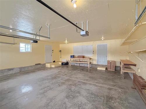81 Mockingbird Drive, Brandon, MB - Indoor Photo Showing Garage
