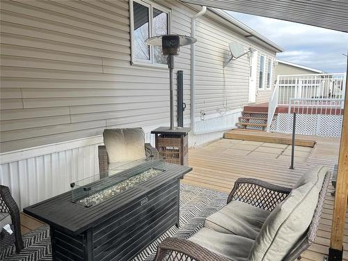 81 Mockingbird Drive, Brandon, MB - Outdoor With Deck Patio Veranda With Exterior