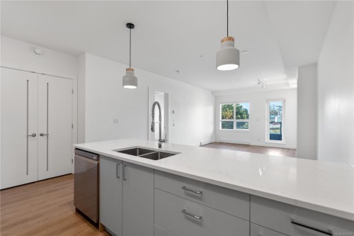 402-757 Tyee Rd, Victoria, BC - Indoor Photo Showing Kitchen With Double Sink With Upgraded Kitchen