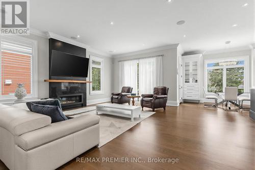 ML Family Room - 111 Codsell Avenue, Toronto, ON - Indoor Photo Showing Living Room With Fireplace