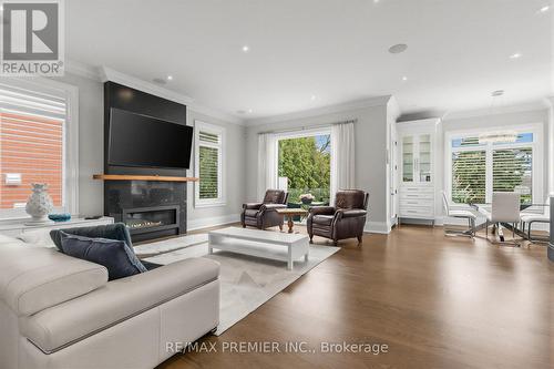 ML Family Room - 111 Codsell Avenue, Toronto, ON - Indoor Photo Showing Living Room With Fireplace