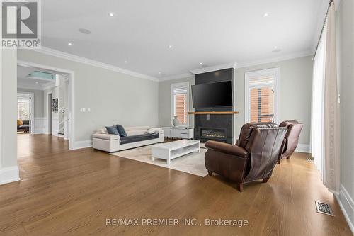 ML Family Room - 111 Codsell Avenue, Toronto, ON - Indoor Photo Showing Living Room With Fireplace