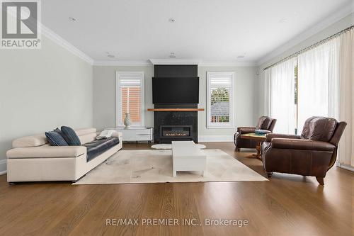 ML Family Room - 111 Codsell Avenue, Toronto, ON - Indoor Photo Showing Living Room With Fireplace