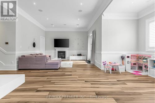 LL Family Room - 111 Codsell Avenue, Toronto, ON - Indoor With Fireplace