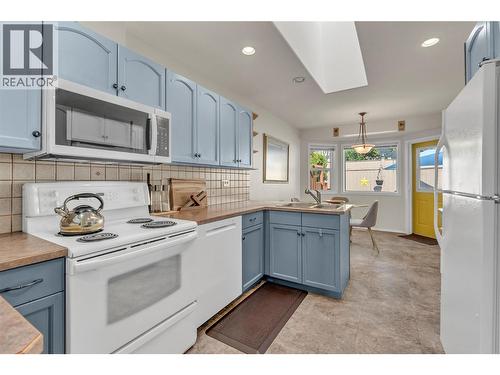 654 Pickering Street Unit# 107, Penticton, BC - Indoor Photo Showing Kitchen With Double Sink