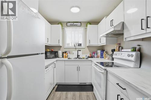 119 - 121 Olmstead Road, Saskatoon, SK - Indoor Photo Showing Kitchen With Double Sink