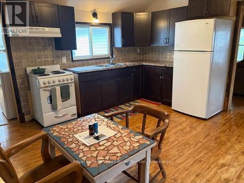 15588 Highway 35, Algonquin Highlands (Stanhope), ON - Indoor Photo Showing Kitchen With Double Sink