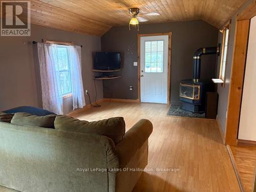 15588 Highway 35, Algonquin Highlands (Stanhope), ON - Indoor Photo Showing Living Room With Fireplace