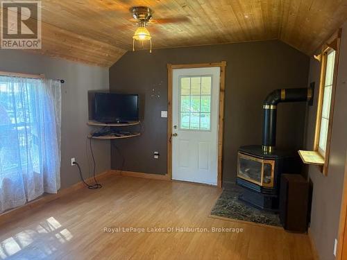 15588 Highway 35, Algonquin Highlands (Stanhope), ON - Indoor With Fireplace