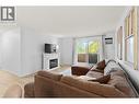 3854 Gordon Drive Unit# 285, Kelowna, BC  - Indoor Photo Showing Living Room With Fireplace 
