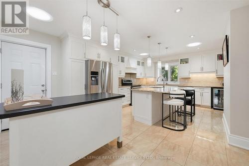 Enjoy a Generous Central Island and Prep Station - 666 Cedar Avenue, Burlington, ON - Indoor Photo Showing Kitchen With Upgraded Kitchen