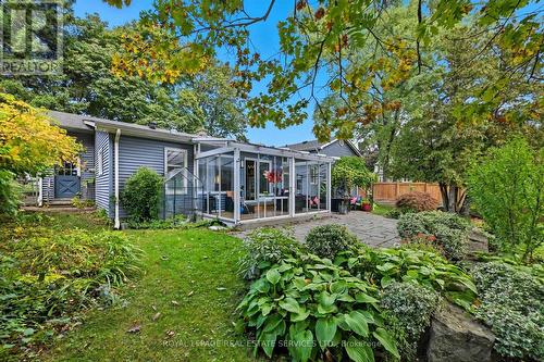 Three-Season Glass Sunroom off Family Room - 666 Cedar Avenue, Burlington, ON - Outdoor With Deck Patio Veranda