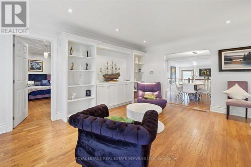 Living Room w/Custom Cabinetry & Display Shelving - 666 Cedar Avenue, Burlington, ON - Indoor Photo Showing Living Room